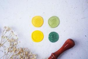 pretty wax coins for a vintage look for wedding or invitation decoration photo