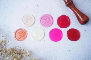 pretty wax coins for a vintage look for wedding or invitation decoration photo