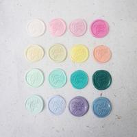 pretty wax coins for a vintage look for wedding or invitation decoration photo