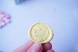 pretty wax coins for a vintage look for wedding or invitation decoration photo