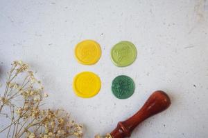 pretty wax coins for a vintage look for wedding or invitation decoration photo