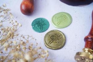 pretty wax coins for a vintage look for wedding or invitation decoration photo