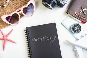 Travel accessories and items with vacation note and copy space, Travel concept photo