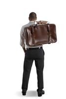 Businessman with suitcase photo