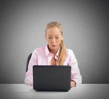 Businesswoman working seriously photo