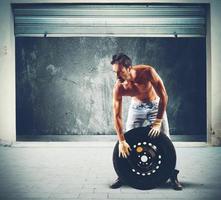 Man repairing a tire photo