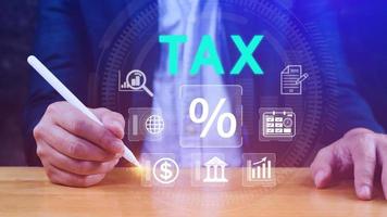 Business using computer to complete Individual income tax return form online for tax payment. Government, state taxes. Data analysis, paperwork, financial research, Calculation tax return. photo