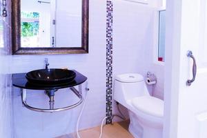 Toilet bowl in a modern bathroom ,flush toilet clean bathroom photo