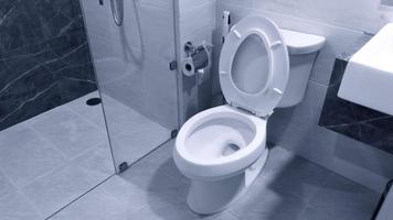 Toilet bowl in a modern bathroom ,flush toilet clean bathroom photo