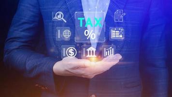 Business using computer to complete Individual income tax return form online for tax payment. Government, state taxes. Data analysis, paperwork, financial research, Calculation tax return. photo