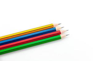 Colorful Pencil  in fist   power of written word on white background photo