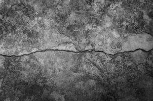 Grungy wall with large crack cement floor texture,cement large crack for dark background photo