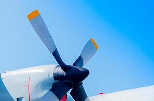 Airplane turboprop engine with propeller on blue sky background, Beautiful color view of the plane. photo