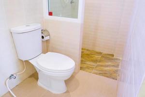 Toilet bowl in a modern bathroom ,flush toilet clean bathroom photo