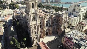 Main facade of the Catedral de la Encarnacion de Malaga, Malaga Cathedral. Aerial view video