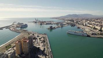 Commercial and touristic port in Malaga, Spain. Aerial panoramic view video