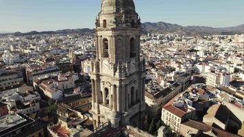 Catedral de la Encarnacion de Malaga, Malaga Cathedral against sprawling cityscape. Aerial view video