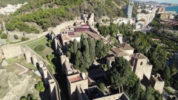 Alcazaba medieval Moorish palace fortification in Malaga, Spain. aerial view