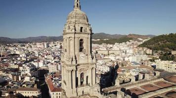 Bell tower, Catedral de la Encarnacion de Malaga, Malaga Cathedral. Aerial orbiting view video
