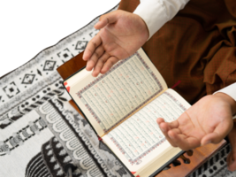 Men pray with backdrop of Quran png