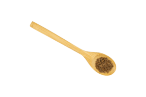 Cumin seeds in a wooden spoon isolated png
