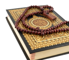 Quran with prayer beads on it png