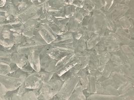 Ice cubes background, ice cube texture or background It makes me feel fresh and feel good, In the summer, ice and cold drinks will make us feel relaxed, Made for beverage or refreshment business. photo