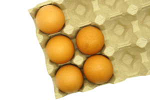 Brown eggs in a paper tray png