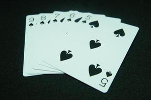 Spade Straight Flush Any sequence all the same suit, for instance 9-8-7-6-5 photo