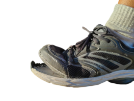 side view of torn shoes, shoes in need of repair on a transparent background png