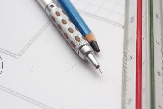 Pencils and ruler on a construction plan, close-up, architect, architecture,drawing architect. photo