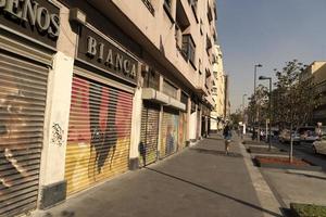 MEXICO CITY, MEXICO - JANUARY 30 2019 - All the shops roll down gates have spray painted graffiti photo