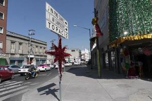 MEXICO CITY, MEXICO - NOVEMBER 5 2017 - People at town street market photo