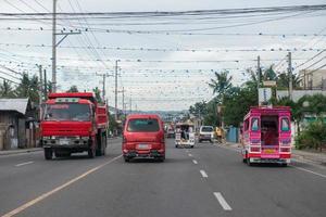 CEBU - PHILIPPINES - JANUARY,7 2013 - Town street congested traffic photo