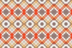 Checkered Plaids pattern seamless is a patterned cloth consisting of criss crossed, horizontal and vertical bands in multiple colours.plaid Seamless For scarf,pyjamas,blanket,duvet,kilt large shawl. vector