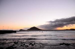 Sunset over the sea photo