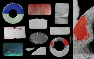 Blank sticker collection for a mockup isolated on black background. Old, torn and dirty sticker pack photo