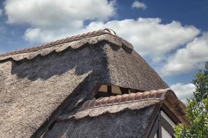 Thatched roof of a cottage photo