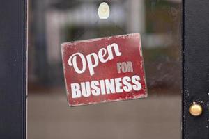 Open for Business sign in a window photo