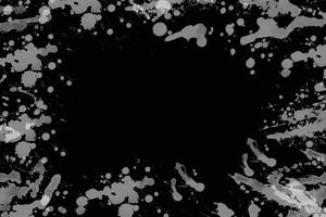 Black and white paint splatter on a black background design photo
