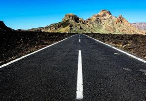 Road through the scenic landscape photo