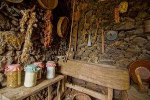 Kitchen area with stone walls photo