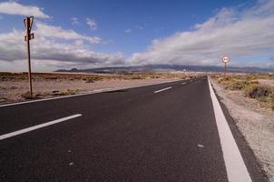 Road through the scenic landscape photo