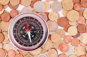 Compass and coins photo