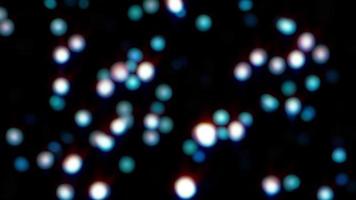 Loop blue glow blurred bubbles particles bokeh abstract background video