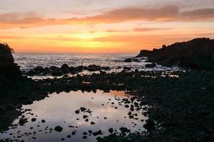 Sunset over the sea photo