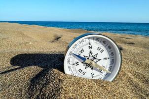 Compass in the sand photo