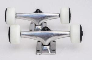 Skateboard wheels on light background photo