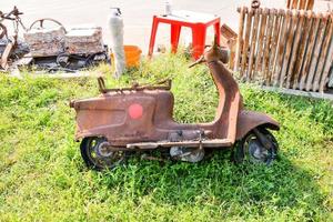 Rusty old scooter photo