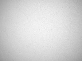 Seamless texture of white cement wall a rough surface, with space for text, for a background. photo